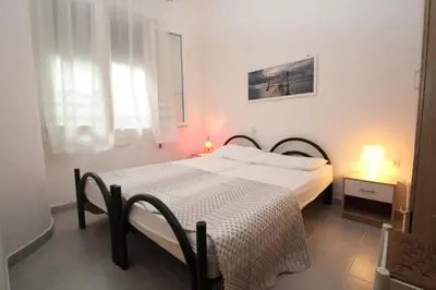Letto o letti in una camera di Faustina 02