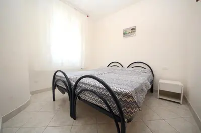 Letto o letti in una camera di Arianna 01
