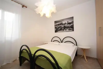 Letto o letti in una camera di Oriella