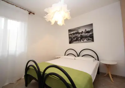 Letto o letti in una camera di Oriella