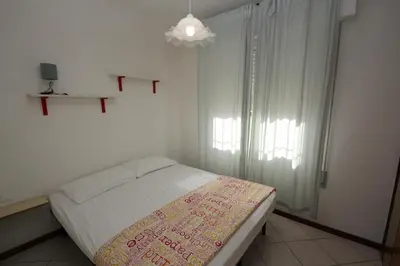 Letto o letti in una camera di Gianni