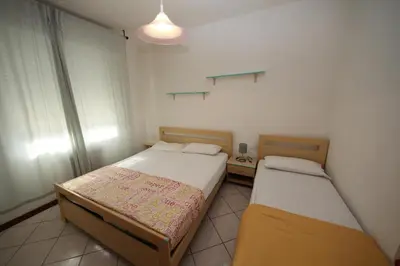 Letto o letti in una camera di Gianni