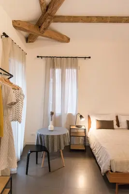 Letto o letti in una camera di Hinc Domus - Venezia