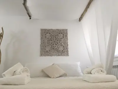 Letto o letti in una camera di Colibrì House ApartSuite Chioggia