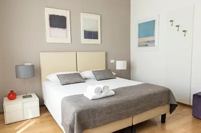 Letto o letti in una camera di B&B Villa Rosa