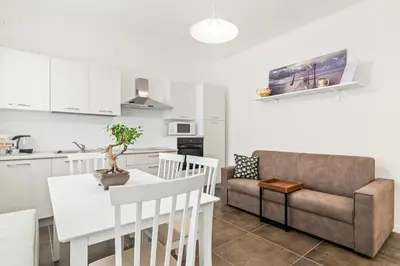 Cucina o angolo cottura di GuestHost - Spa and Relax Lovely Apartment
