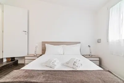 Letto o letti in una camera di GuestHost - Spa and Relax Lovely Apartment