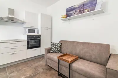 Cucina o angolo cottura di GuestHost - Spa and Relax Lovely Apartment