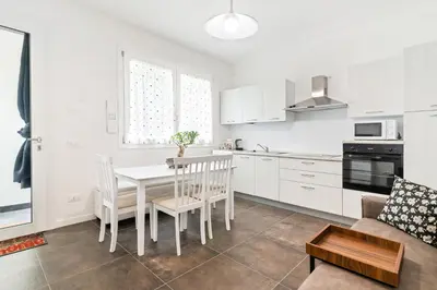 Cucina o angolo cottura di GuestHost - Spa and Relax Lovely Apartment