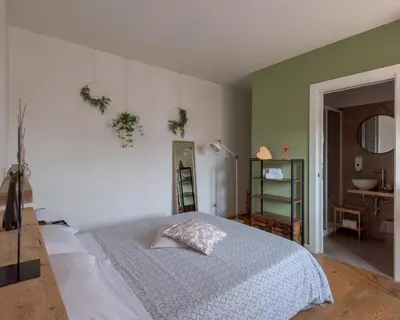 Letto o letti in una camera di BACARìA DA DANTE Rooms