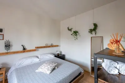 Letto o letti in una camera di BACARìA DA DANTE Rooms