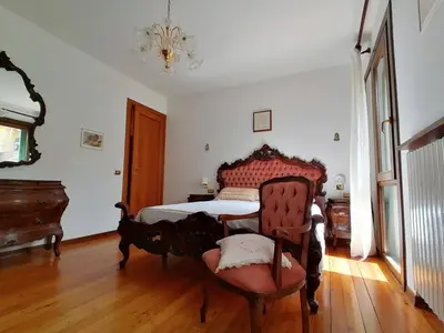 Letto o letti in una camera di Villa Giuliana
