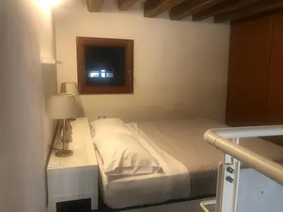 Letto o letti in una camera di Venetian Loft House