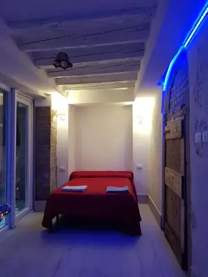 Letto o letti in una camera di the secret garden in the very heart of Venice