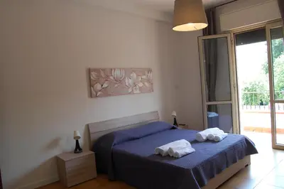 Letto o letti in una camera di Locazione Turistica Elite Parco Brentelle bed & breakfast - Chiesanuova 135 e 167
