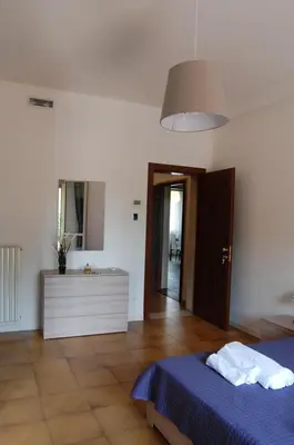 Letto o letti in una camera di Locazione Turistica Elite Parco Brentelle bed & breakfast - Chiesanuova 135 e 167