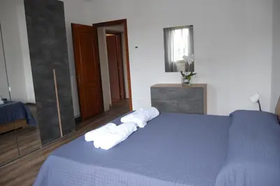 Letto o letti in una camera di Locazione Turistica Elite Parco Brentelle bed & breakfast - Chiesanuova 135 e 167