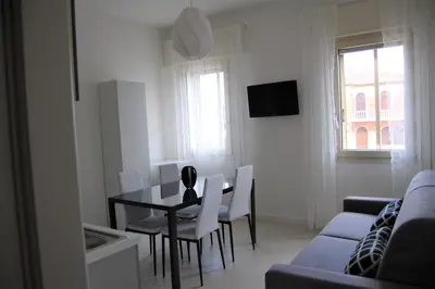 TV o dispositivi per l'intrattenimento presso Locazione Turistica Elite Parco Brentelle bed & breakfast - Chiesanuova 135 e 167