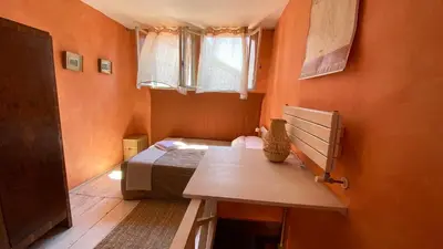 Letto o letti in una camera di CA' ROMANTICA - BIG APPARTMENT at ACCADEMIA