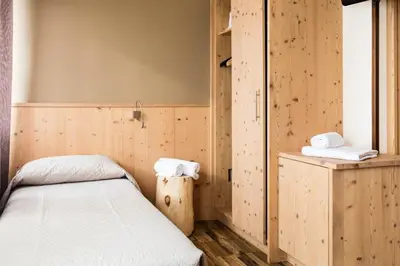 Letto o letti in una camera di Locanda Montegrappa