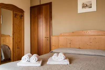 Letto o letti in una camera di Locanda Montegrappa