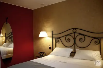 Letto o letti in una camera di Locanda Viridarium