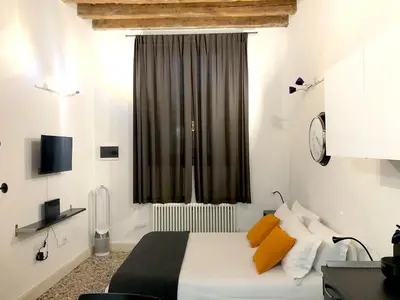 Letto o letti in una camera di Residenza Pedrotti