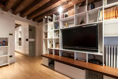 TV o dispositivi per l'intrattenimento presso Bellissimo appartamento in Palazzo Storico