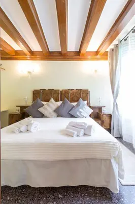 Letto o letti in una camera di Residence Suite a Venezia