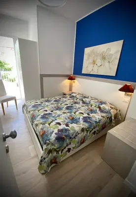 Letto o letti in una camera di HOTEL D'ANNUNZIO