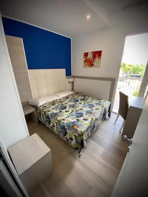 Letto o letti in una camera di HOTEL D'ANNUNZIO