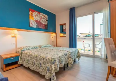 Letto o letti in una camera di HOTEL D'ANNUNZIO