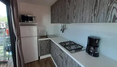 Cucina o angolo cottura di Casa mobile Gustocamp a Cavallino Treporti