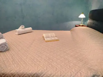 Letto o letti in una camera di The House on the Canal