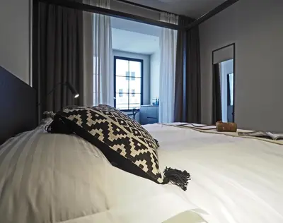 Letto o letti in una camera di Dimora Arco di Mezzo
