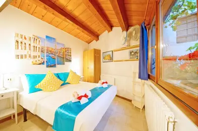 Letto o letti in una camera di Corte Rota Terrace San Marco