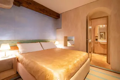 Letto o letti in una camera di Ca' del Fontego - Luxury Grand Canal