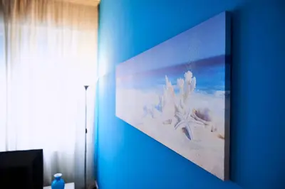 TV o dispositivi per l'intrattenimento presso Appartamento Flaminia 30 metri dal mare