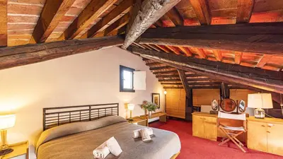Letto o letti in una camera di Penthouse Accademia