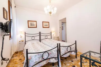 Letto o letti in una camera di Residenza Ca' Renata
