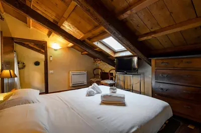 Letto o letti in una camera di Casa Lia