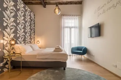 Letto o letti in una camera di Blooms Botanical Rooms