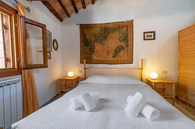 Letto o letti in una camera di Casa Violante