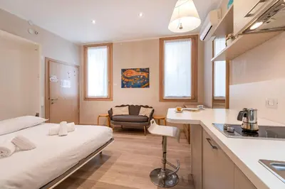 Letto o letti in una camera di Casa del Pittore Rialto