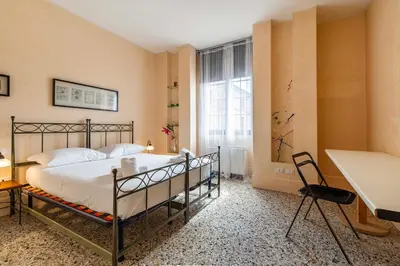 Letto o letti in una camera di Residenza dell'Arte
