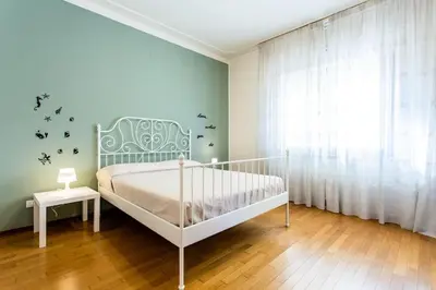 Letto o letti in una camera di La Bella Vita - Maison Dina