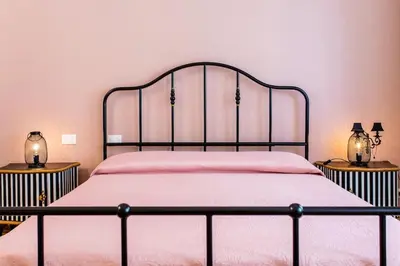 Letto o letti in una camera di La Bella Vita - Maison Dina