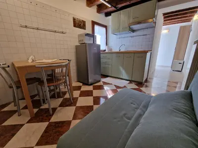Cucina o angolo cottura di Veneziacentopercento Nicoli Apartment
