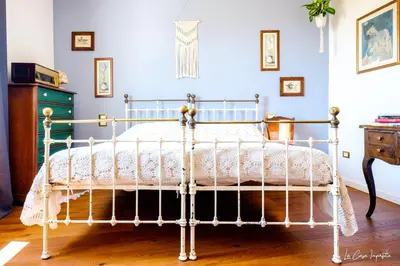 Letto o letti in una camera di La Casa Imperfetta