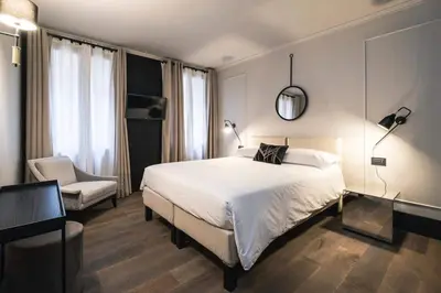 Letto o letti in una camera di LUXURY SANTO STEFANO